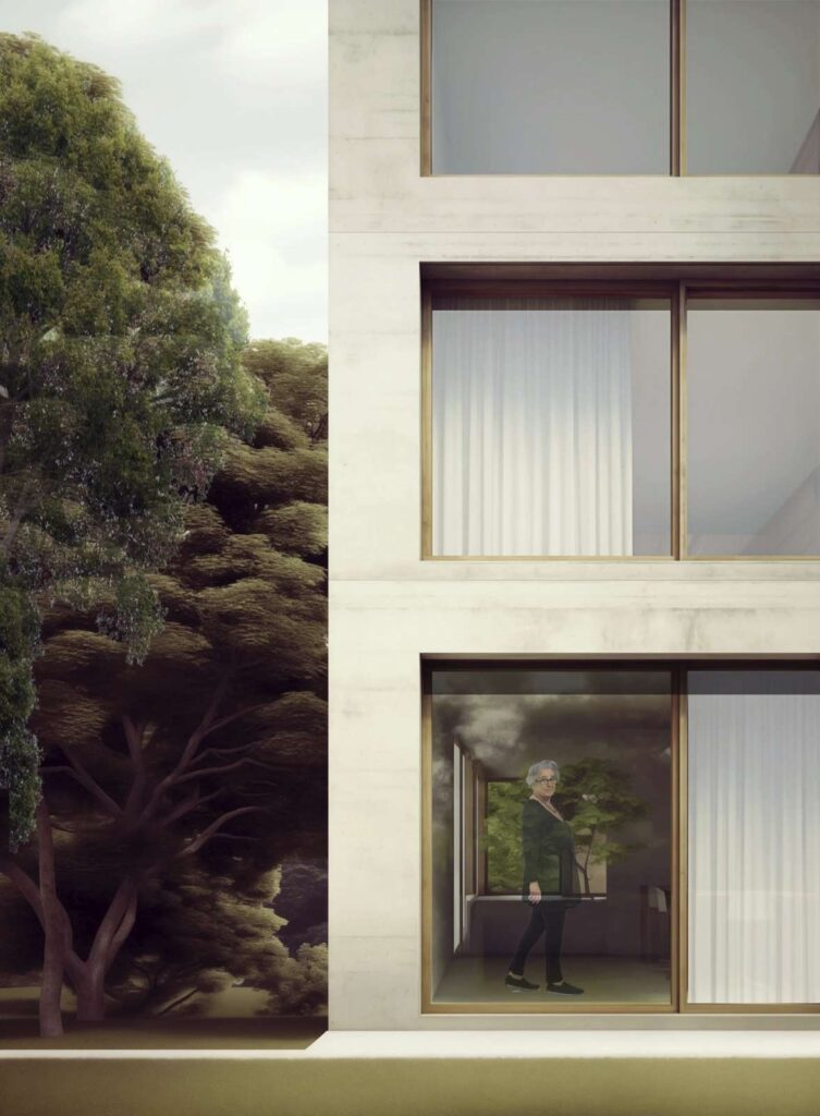 La maison Malon, façade en béton et grandes baies en bois, une habitante derrière la baie du séjour