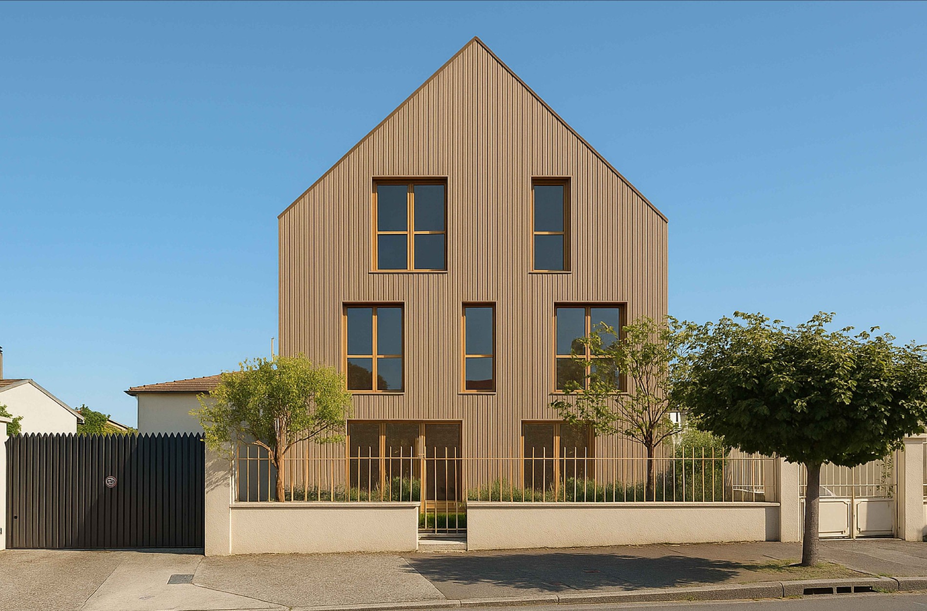 Vue depuis la rue du Rateau, façade pignon bardée de bois